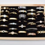 Ατσάλινο Βραχιόλι – Χειροπέδα Επιχρυσωμένη με Μάτι & Ποικιλία Στοιχείων