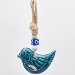 Κρεμαστό κεραμικό πουλί με λευκή χάντρα