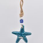 Κρεμαστό κεραμικό αστερίας με λευκή χάντρα